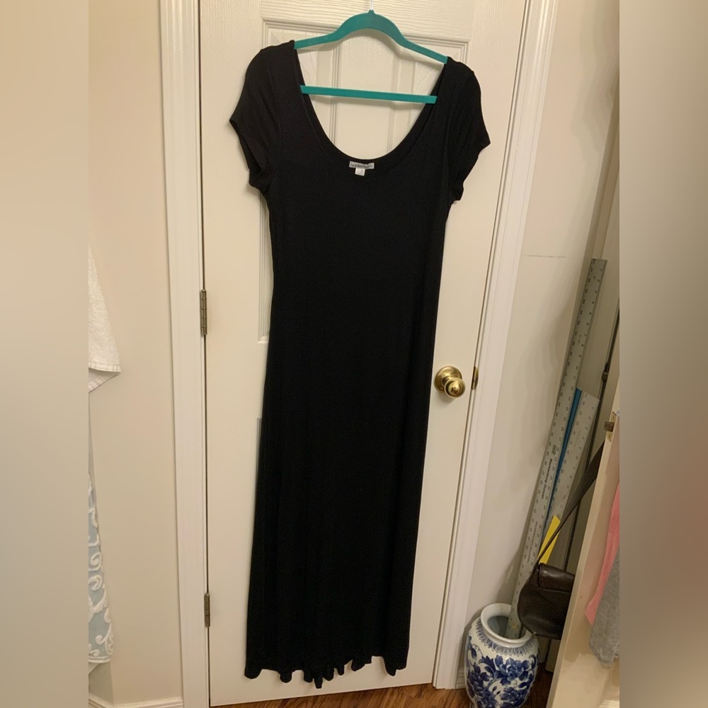 Junior’s cap sleeve maxi with kick pleat in back and built in slip.